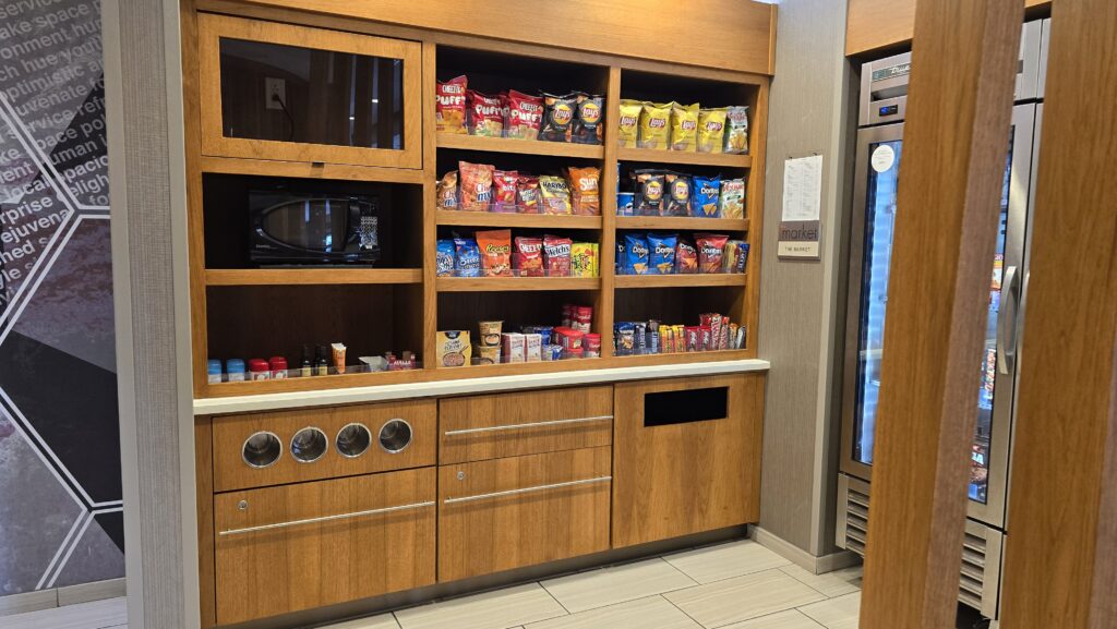 Built-in wood market millwork unit fabricated and installed for a hotel lobby pantry